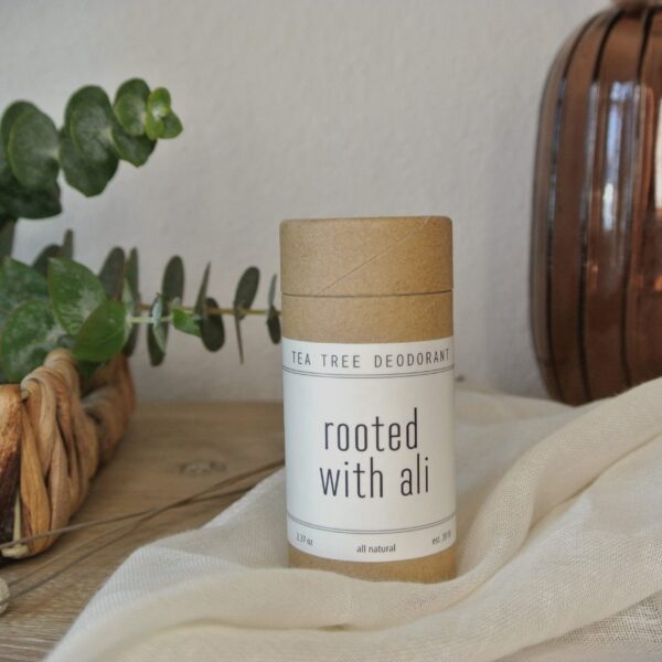 tea tree deodorant on table