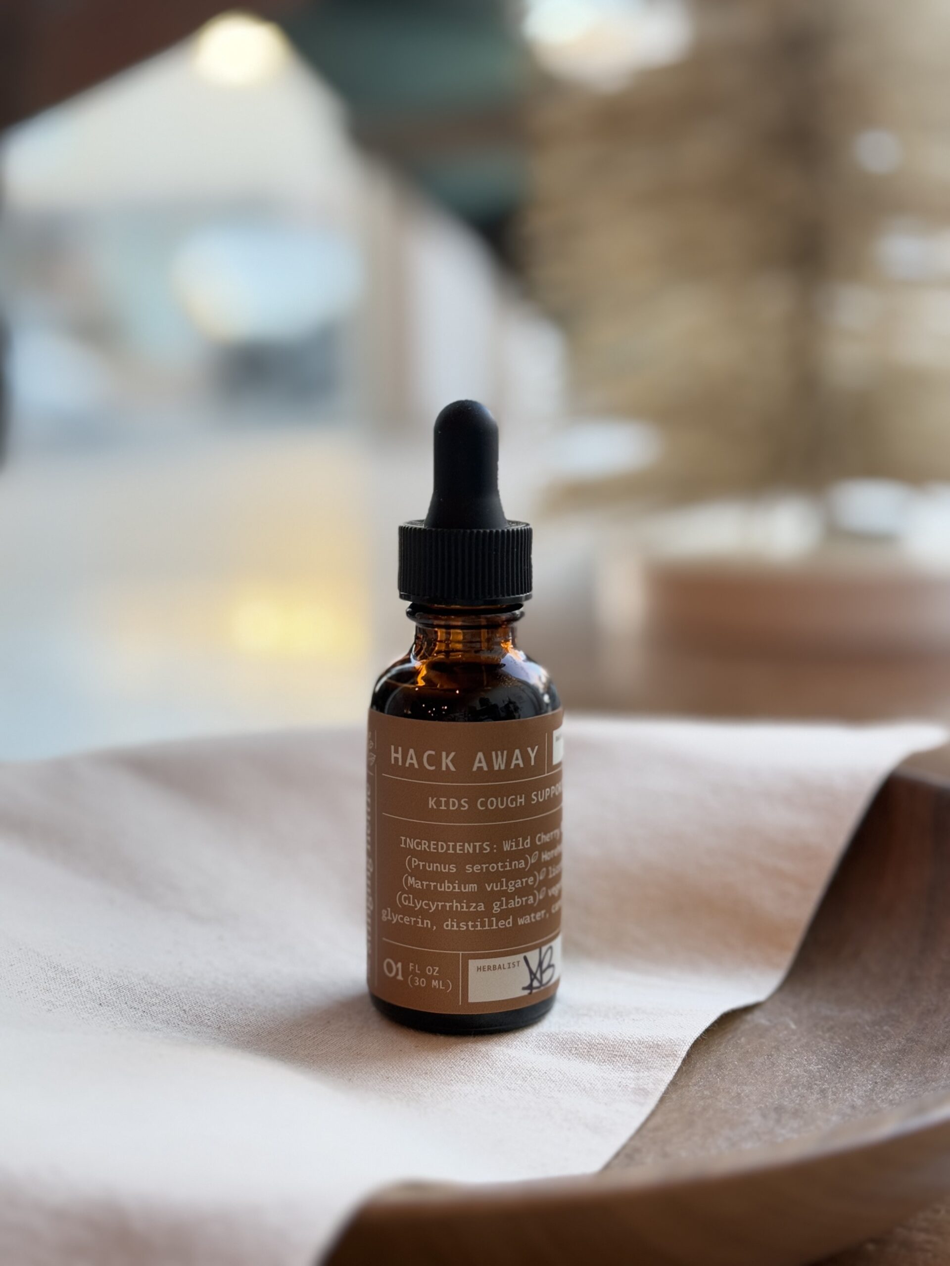 hack away kids tincture sitting on bowl