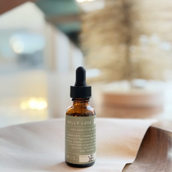 belly love kids tincture sitting in the bowl
